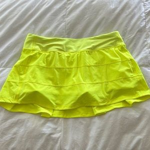 Lululemon Pace Rival skirt. Excellent condition! Tennis ball green/yellow!